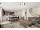 Open-concept living space featuring a modern kitchen, dining area, and cozy living room at 8811 Meade St, Westminster, CO 80031