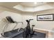 Home gym with treadmill, stationary bike, and recessed lighting at 2486 S Monroe St, Denver, CO 80210