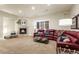 Cozy living room featuring a fireplace and comfortable leather seating at 2486 S Monroe St, Denver, CO 80210
