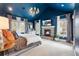 Luxurious main bedroom featuring a fireplace, vaulted ceilings, ample natural light, and designer window treatments at 2486 S Monroe St, Denver, CO 80210