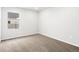 Bedroom with neutral walls and carpet, with a window at 763 N Tibet St, Aurora, CO 80018