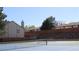 Community tennis court near townhomes, perfect for recreational sports and neighborhood fun at 155 Xenon St # 33, Denver, CO 80228