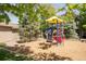 Colorful playground with shade trees is a great community amenity at 8405 Pebble Creek Way # 202, Highlands Ranch, CO 80126