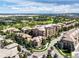 Aerial view of a well-maintained community with lush landscaping, green spaces, and easy access to local amenities at 10152 Inverness Main St, Englewood, CO 80112