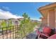 Scenic balcony view with outdoor seating, providing a relaxing space to enjoy the surrounding neighborhood at 10152 Inverness Main St, Englewood, CO 80112