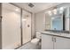 Bathroom featuring tile floors, a glass shower, and a granite vanity at 3573 S Lisbon Ct, Aurora, CO 80013