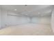 Open basement area with recessed lighting, plush carpeting, and potential for customization, perfect for entertainment at 203 S Jackson St, Denver, CO 80209