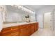 Beautiful bathroom with a double vanity, ample cabinet space, and stylish fixtures and lighting at 203 S Jackson St, Denver, CO 80209