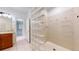Bright bathroom with glass block shower, offering a blend of style and functionality at 203 S Jackson St, Denver, CO 80209