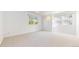 Spacious bedroom with carpet flooring, two windows, and ample natural light at 203 S Jackson St, Denver, CO 80209