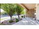 Charming front porch with stone accents, landscaping, and views of the street at 203 S Jackson St, Denver, CO 80209