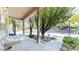 Cozy front porch with columns and views of the neighborhood street at 203 S Jackson St, Denver, CO 80209