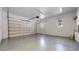 Spacious garage with epoxy floors, bright lighting, and lots of room for storage at 203 S Jackson St, Denver, CO 80209