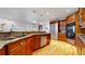 Stylish kitchen featuring stainless steel appliances and ample cabinet space at 203 S Jackson St, Denver, CO 80209