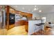 Well-appointed kitchen with stainless steel appliances and eat-in bar at 203 S Jackson St, Denver, CO 80209