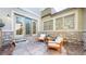 Private patio with stone surround, chairs and table - great for relaxing outdoors! at 203 S Jackson St, Denver, CO 80209
