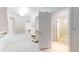 Spacious walk-in closet boasts custom shelving and storage solutions, offering plenty of space and organization at 203 S Jackson St, Denver, CO 80209