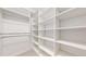 Spacious walk-in closet with ample shelving and hanging space, perfect for organized storage at 203 S Jackson St, Denver, CO 80209