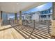 Covered deck with wood flooring and views of the community at 8570 Eagle River St, Littleton, CO 80125