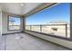 Deck with tile flooring and expansive neighborhood views at 8570 Eagle River St, Littleton, CO 80125