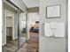 Bathroom with mirrored closet and bedroom view at 2182 S Zeno St, Aurora, CO 80013