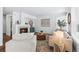 Living room with fireplace, comfortable seating, and wooden floors at 2182 S Zeno St, Aurora, CO 80013