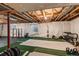 Unfinished basement space featuring gym equipment, exposed ceiling and concrete walls and floors at 10284 Royal Eagle St, Highlands Ranch, CO 80129