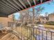 Private balcony overlooking the backyard and trees at 2665 S Sheridan Ct, Lakewood, CO 80227