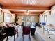 Community room with leather furniture and access to a patio at 2665 S Sheridan Ct, Lakewood, CO 80227