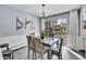 Bright dining room with access to a private balcony at 2665 S Sheridan Ct, Lakewood, CO 80227