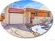 Brick ranch home with attached garage and covered entryway at 2665 S Sheridan Ct, Lakewood, CO 80227