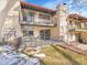 Back patio with wrought iron fencing, access from sliding glass door at 2665 S Sheridan Ct, Lakewood, CO 80227