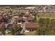 Bird's eye view of multiple homes, surrounded by lush greenery and blue sky at 726 Dreamcatcher Ln, Evergreen, CO 80439
