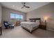 Cozy main bedroom with mountain views, a king-size bed, and comfortable seating area at 726 Dreamcatcher Ln, Evergreen, CO 80439
