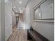 Hallway with wood flooring and a staircase leading to the upper level at 726 Dreamcatcher Ln, Evergreen, CO 80439