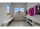 Cozy mudroom with shoe racks and coat hooks creating a tidy and organized space for the home at 726 Dreamcatcher Ln, Evergreen, CO 80439