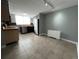 Well-lit kitchen with stainless steel appliances, modern cabinets, and tiled flooring for easy maintenance at 1155 Ash St # 202, Denver, CO 80220