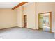 Large bedroom with neutral carpet, natural light and access to a large closet and ensuite bathroom at 108 Ward Ct, Lakewood, CO 80228