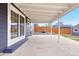 Spacious covered patio with seating area perfect for outdoor entertaining at 1805 W 51St Ave, Denver, CO 80221