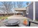Relaxing backyard with fire pit and covered patio, perfect for entertaining at 1805 W 51St Ave, Denver, CO 80221