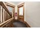 Hallway with wood trim, doors, and fire extinguisher at 1210 E Colfax Ave # 301, Denver, CO 80218