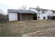 Backyard view showcasing large lattice-covered patio area at 3825 E 123Rd Ave, Thornton, CO 80241