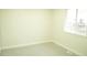 Bedroom featuring a neutral colored carpet, paint and window for natural light at 3825 E 123Rd Ave, Thornton, CO 80241