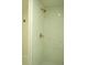 Shower featuring updated gold fixtures, tile surround and shower head at 3825 E 123Rd Ave, Thornton, CO 80241