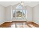 Spacious bedroom with hardwood floors and a large window at 2503 S Toledo Way, Aurora, CO 80014