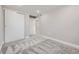 Simple bedroom with grey carpet and double door closet at 3227 N Steele St, Denver, CO 80205