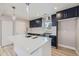 Modern kitchen with white countertops and dark blue cabinets at 3227 N Steele St, Denver, CO 80205