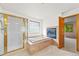 Luxurious bathroom with a shower, separate bathtub, and inviting fireplace at 5284 Taft Ct, Arvada, CO 80002
