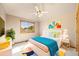 Bright bedroom with colorful decor, natural light, and stylish furnishings at 5284 Taft Ct, Arvada, CO 80002