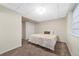 Bedroom with a plush bed, carpet floors, and large window at 5284 Taft Ct, Arvada, CO 80002